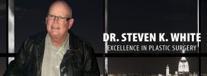 Dr. Steven White Plastic Surgeon in a convention center with city background